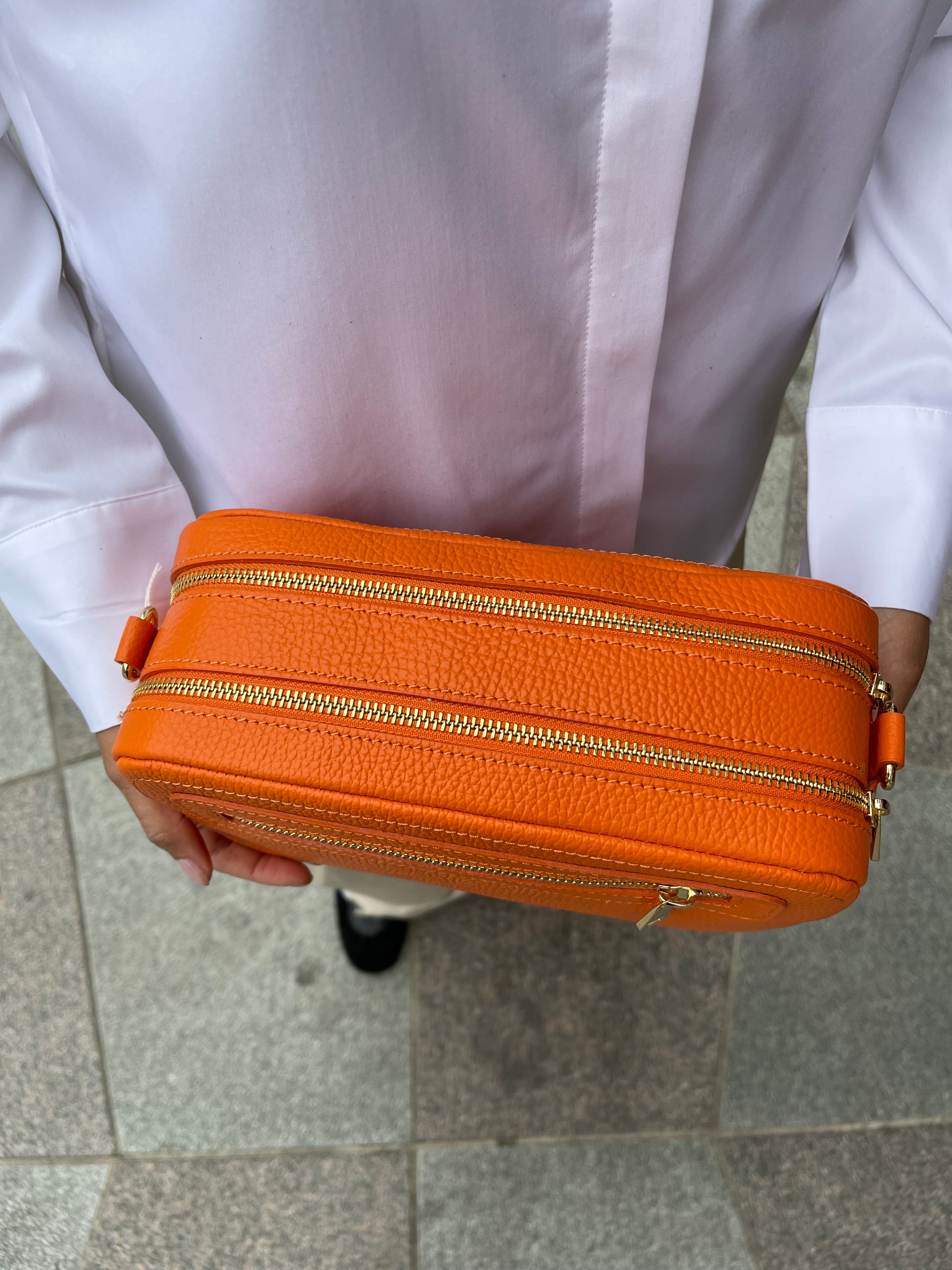 Orange clutch med double rum