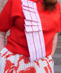 Polo bluse med lyserøde detaljer